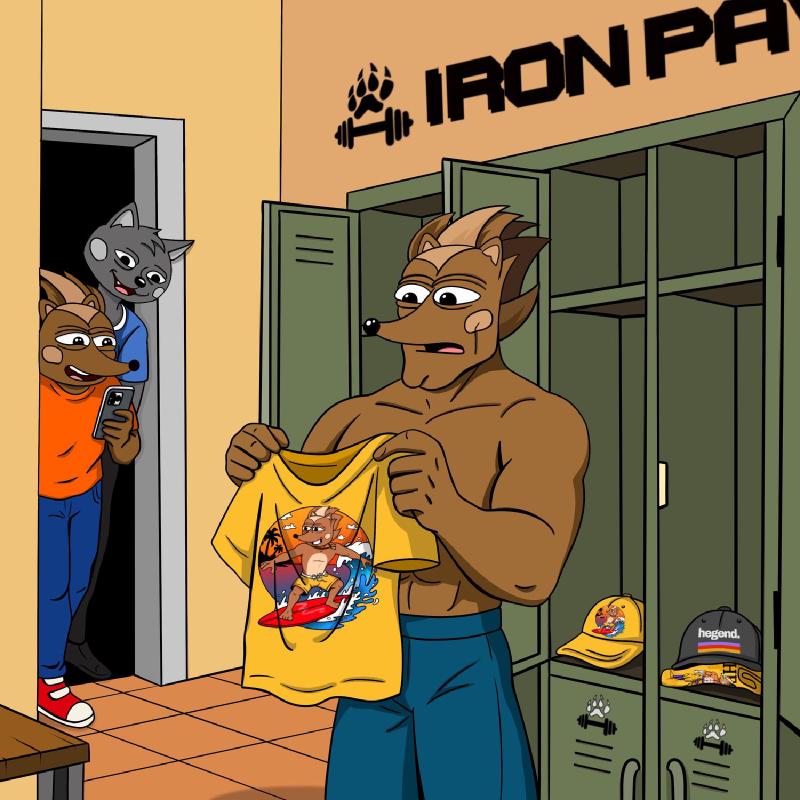 Hendrix holding a yellow t-shirt with a picture of Hege surfing, about five sizes too small for him