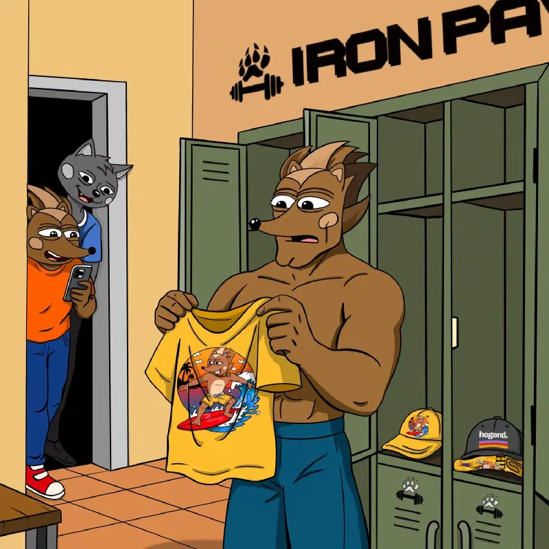 Hendrix holding a yellow t-shirt with a picture of Hege surfing, about five sizes too small for him