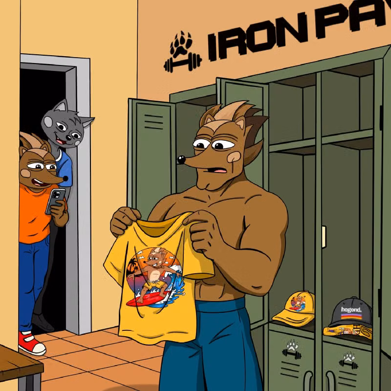 Hendrix holding a yellow t-shirt with a picture of Hege surfing, about five sizes too small for him